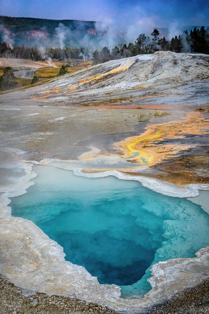 A hot blue pool of water in Yellowstone.