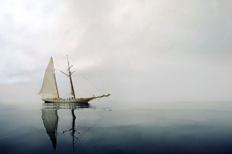 A meditative image of a large schooner becalmed 1000 miles from land.